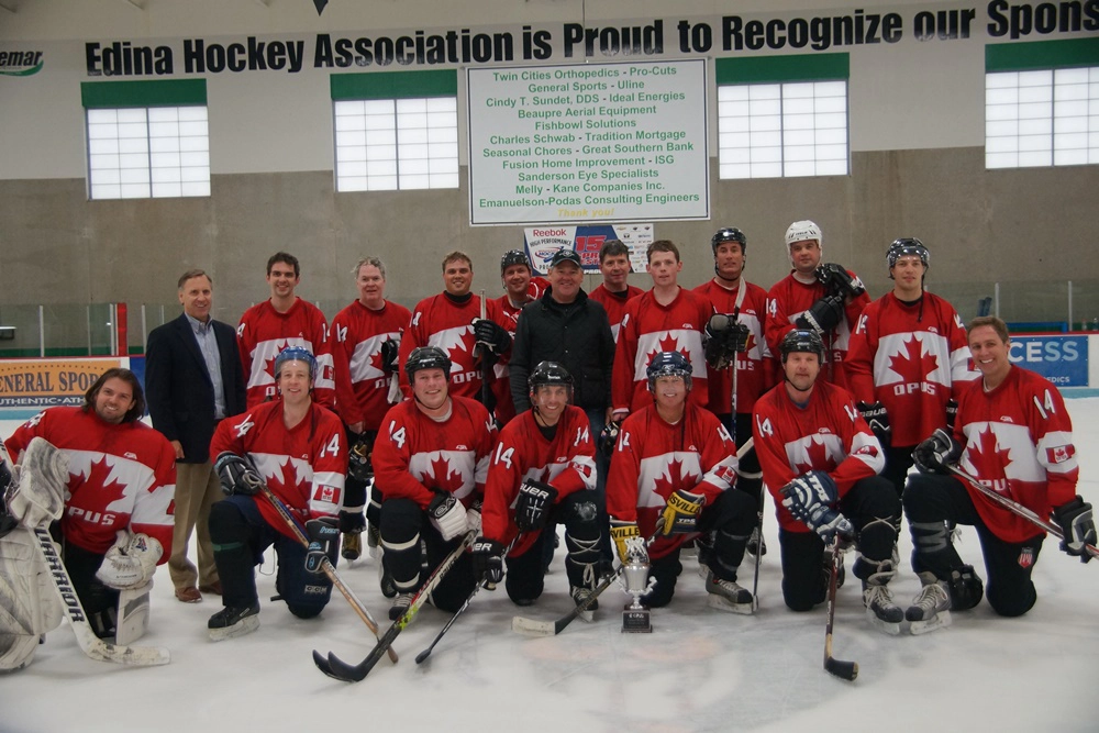 goup of men in hockey gear in rink